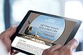 Hände die iPad halten mit Maine Interior e-News